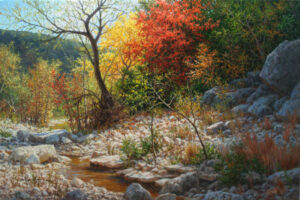 Radiance of Autumn giclee showing a realistic Texas autumn landscape with a red tree and shallow stream by artist William Hagerman.