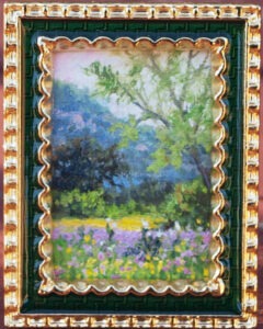 Miniature Texas Hill Country oil painting featuring a meadow of yellow and purple spring wildflowers with distant blue hills and trees under a soft sky, painted by William Byron Hagerman